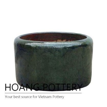 Burnt green low round ceramic planter