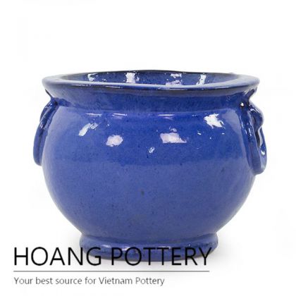Small blue ceramic bowl planter