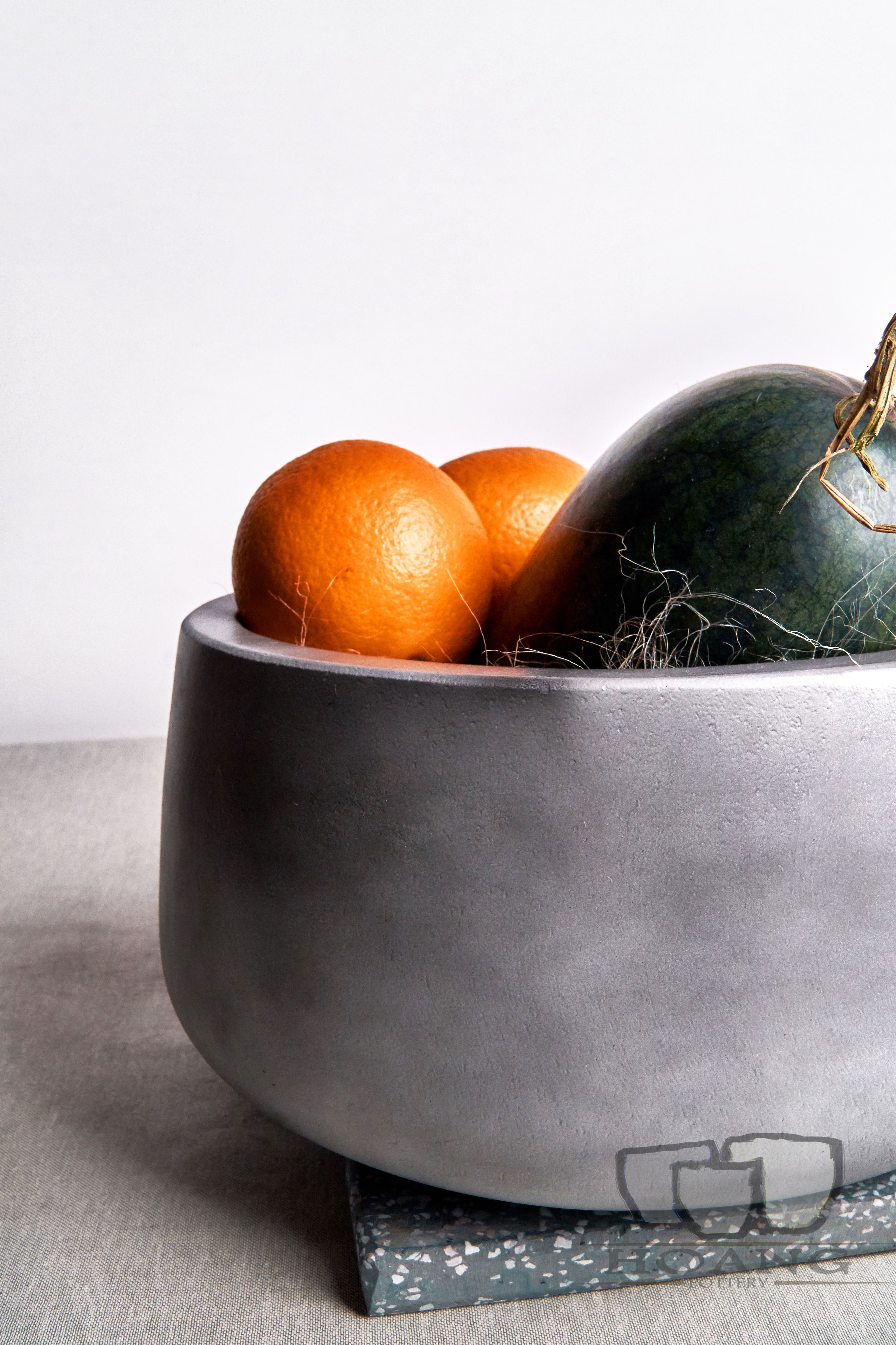 Round grey cement pot