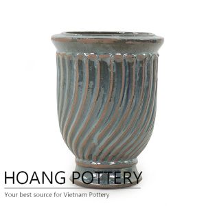 Beautiful antique tornado cup planter