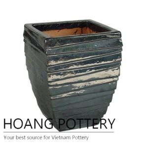 Glossy black slash ceramic pot