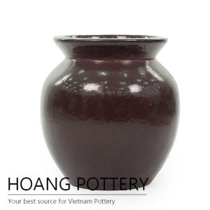 Small red ceramic urn planter