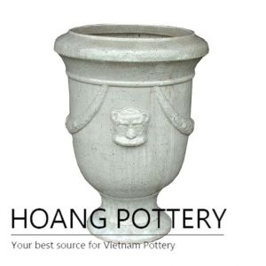 Tall white ceramic pattern cup