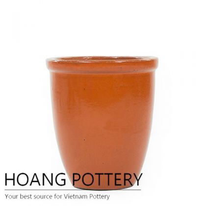 Giant orange round ceramic planter pot