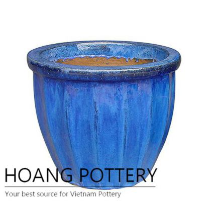 Low round blue ceramic patio pot