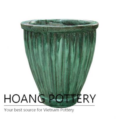 Rustic green ceramic planter pot