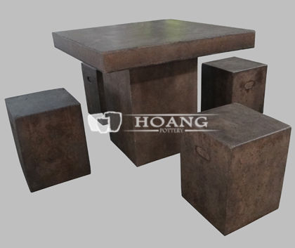 Brown cement tables and chairs