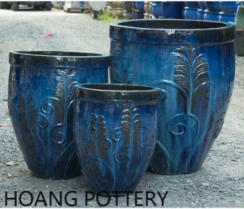 Tall glazed ceramic planter from hoang pottery.